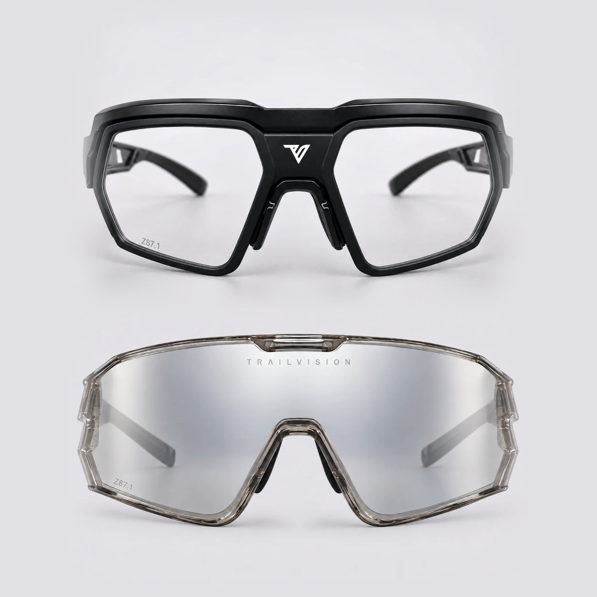 Trailvision Safety Duo: Titan (black, clear lens) and Bastion (transparent grey, photochromic shield), front view