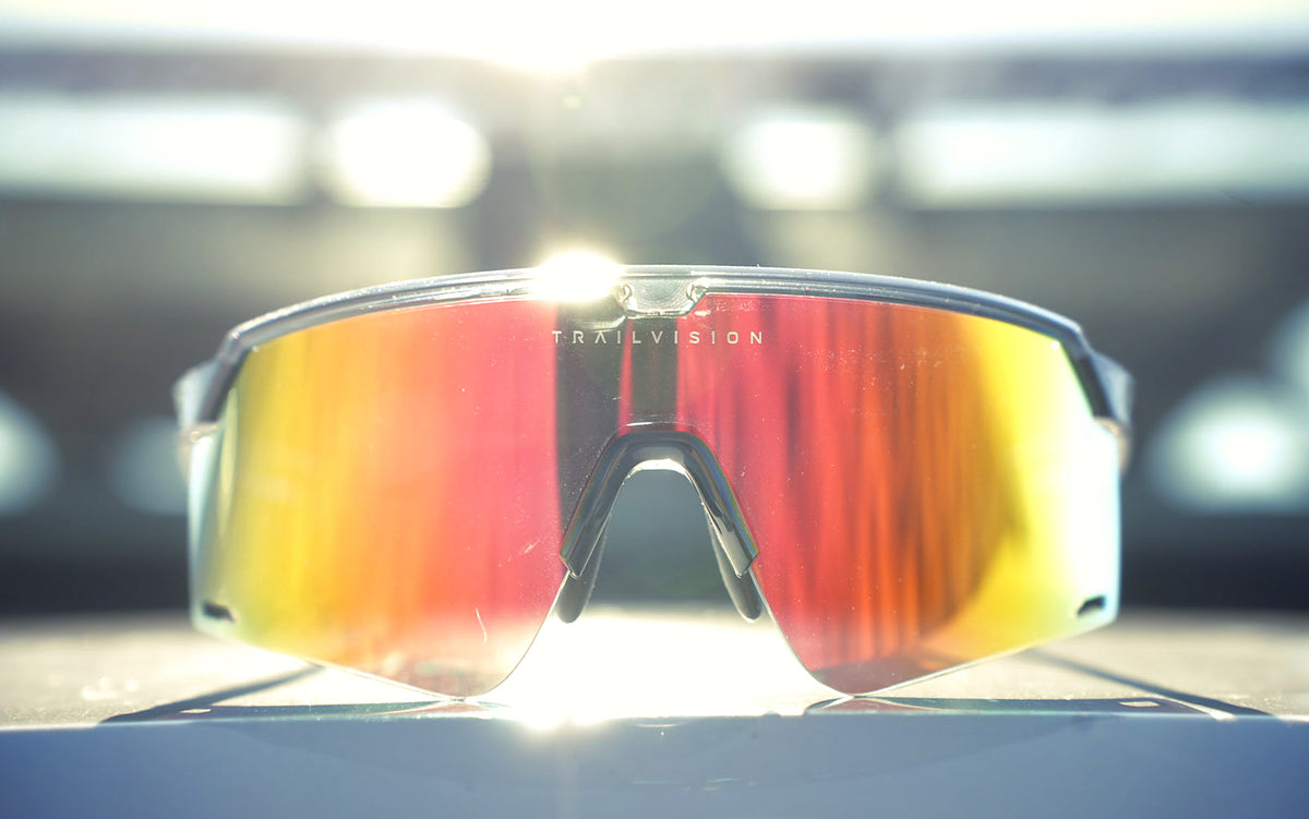 Trailvision shield sunglasses on a rock