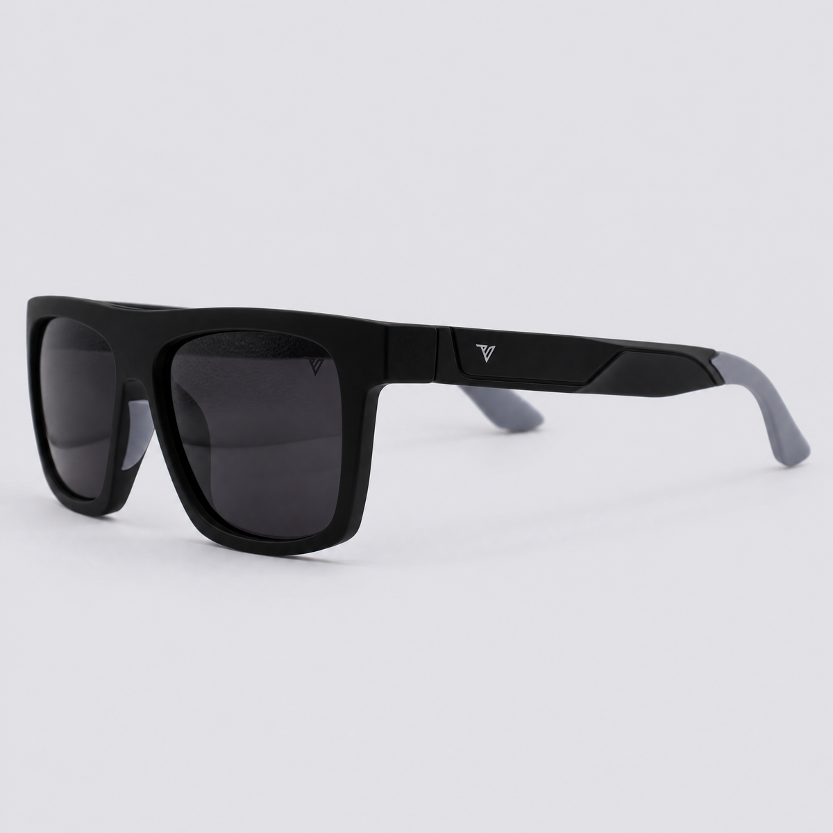 Trailvision Wayfinder sunglasses, Matte Black frame with grey temple tips and polarized Smoke lenses, angle view