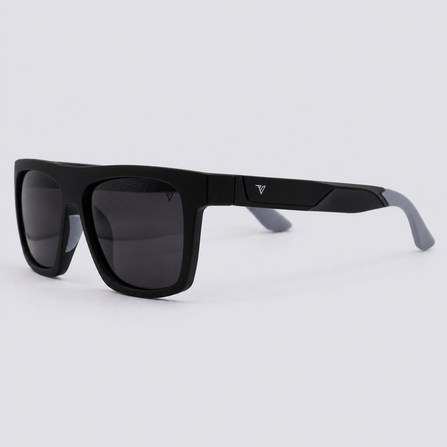 Trailvision Wayfinder sunglasses, Matte Black frame with grey temple tips and polarized Smoke lenses, angle view