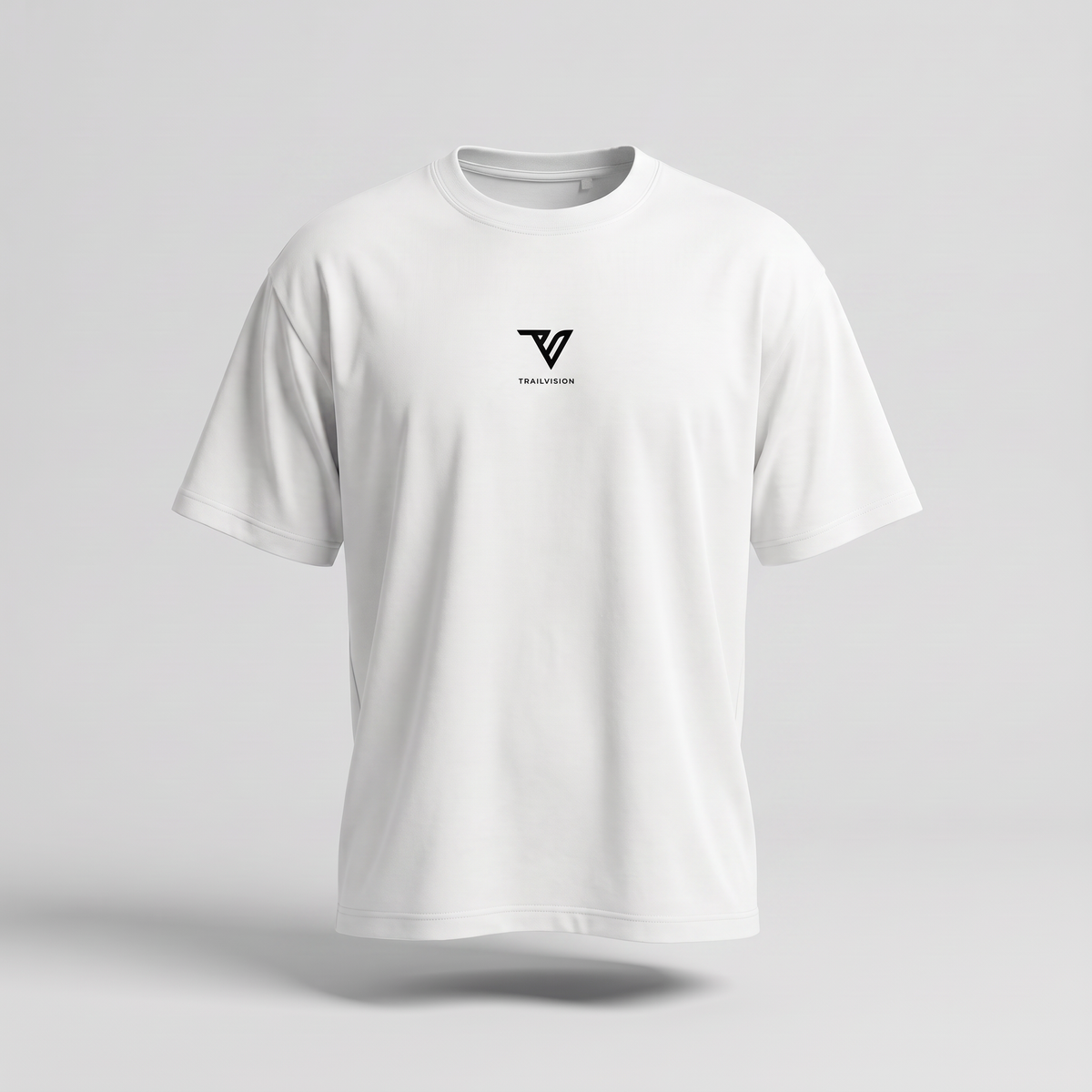 001 Oversized Tee in white, front view, small black Trailvision logo on chest