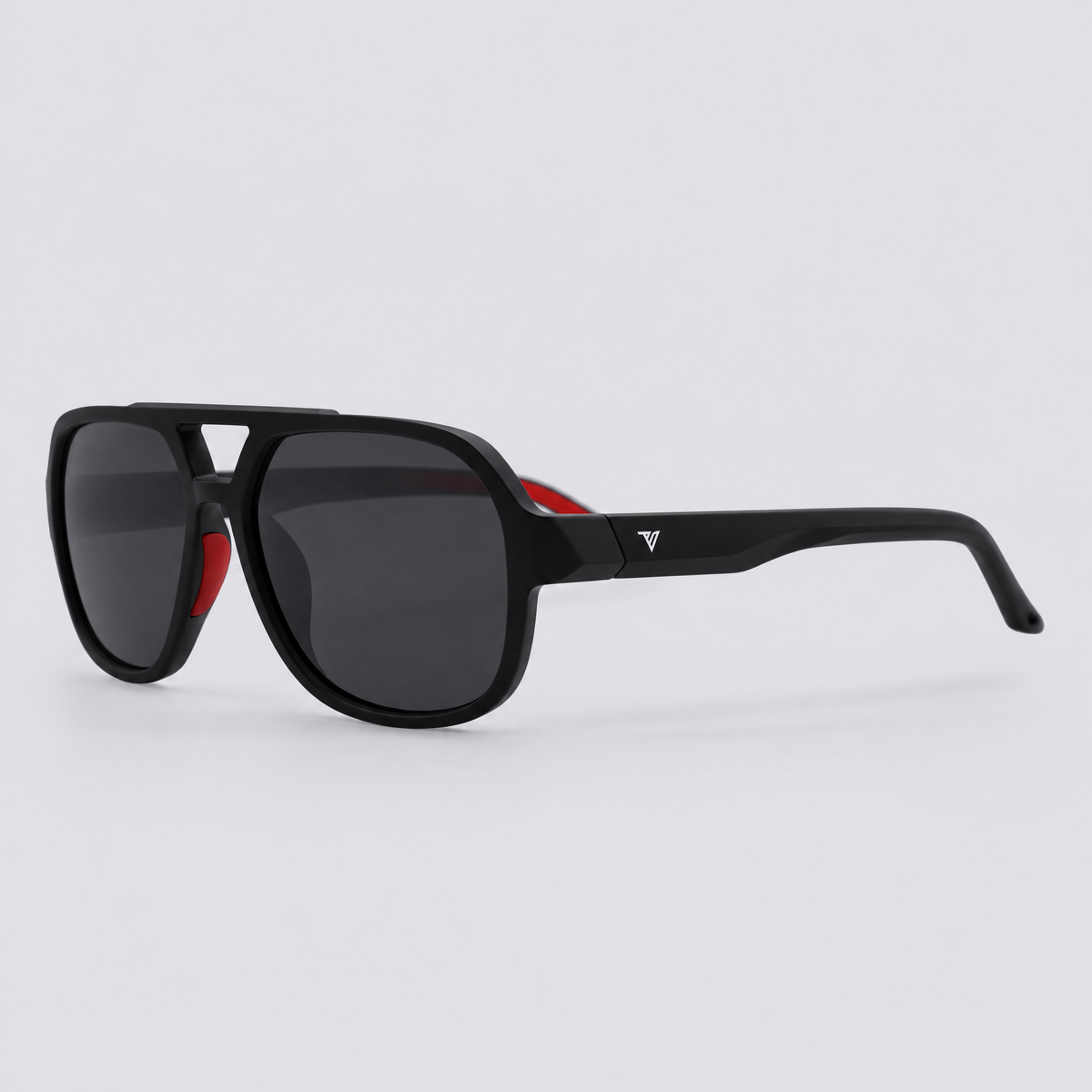 Trailvision Overland sunglasses, Matte Black frame with red accents and polarized Smoke lenses, angle view