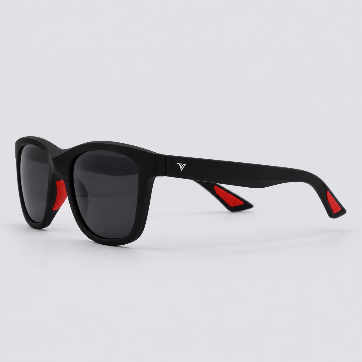 Trailvision Redrock sunglasses, Matte Black frame with red accents and polarized Smoke lenses, angle view