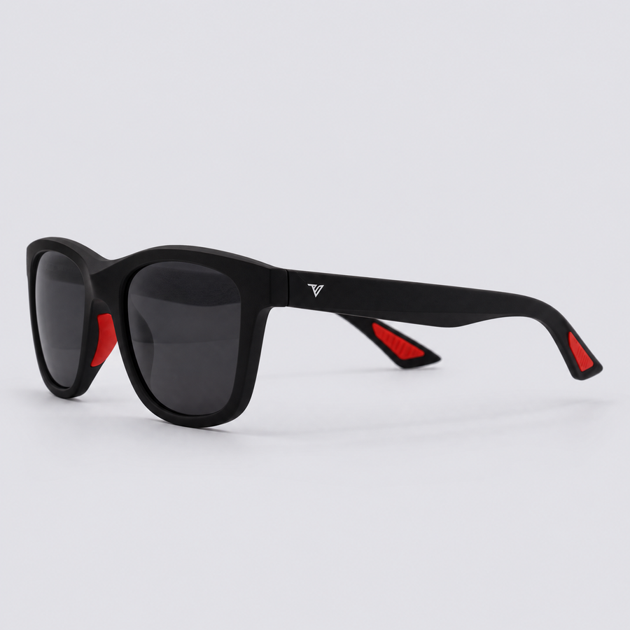 Trailvision Redrock sunglasses, Matte Black frame with red accents and polarized Smoke lenses, angle view