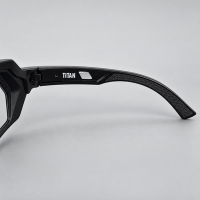 Titan inner temple with white TITAN lettering and textured rubber grip tip
