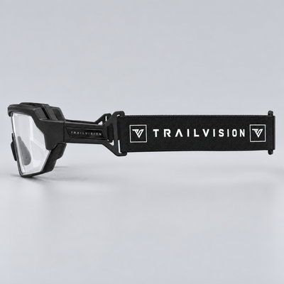 Titan side profile with the black elastic TRAILVISION strap attached to the temple clips