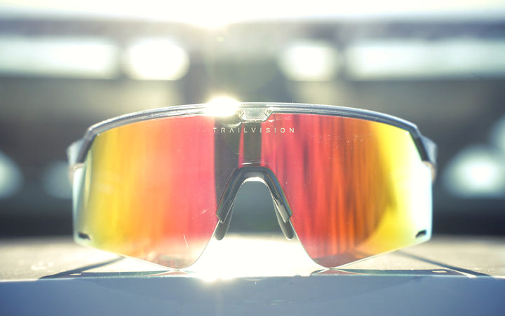 Trailvision shield sunglasses on a rock