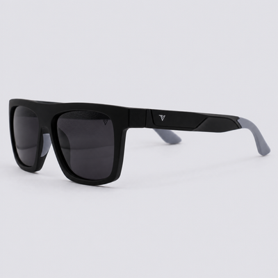 Trailvision Wayfinder sunglasses, Matte Black frame with grey temple tips and polarized Smoke lenses, angle view
