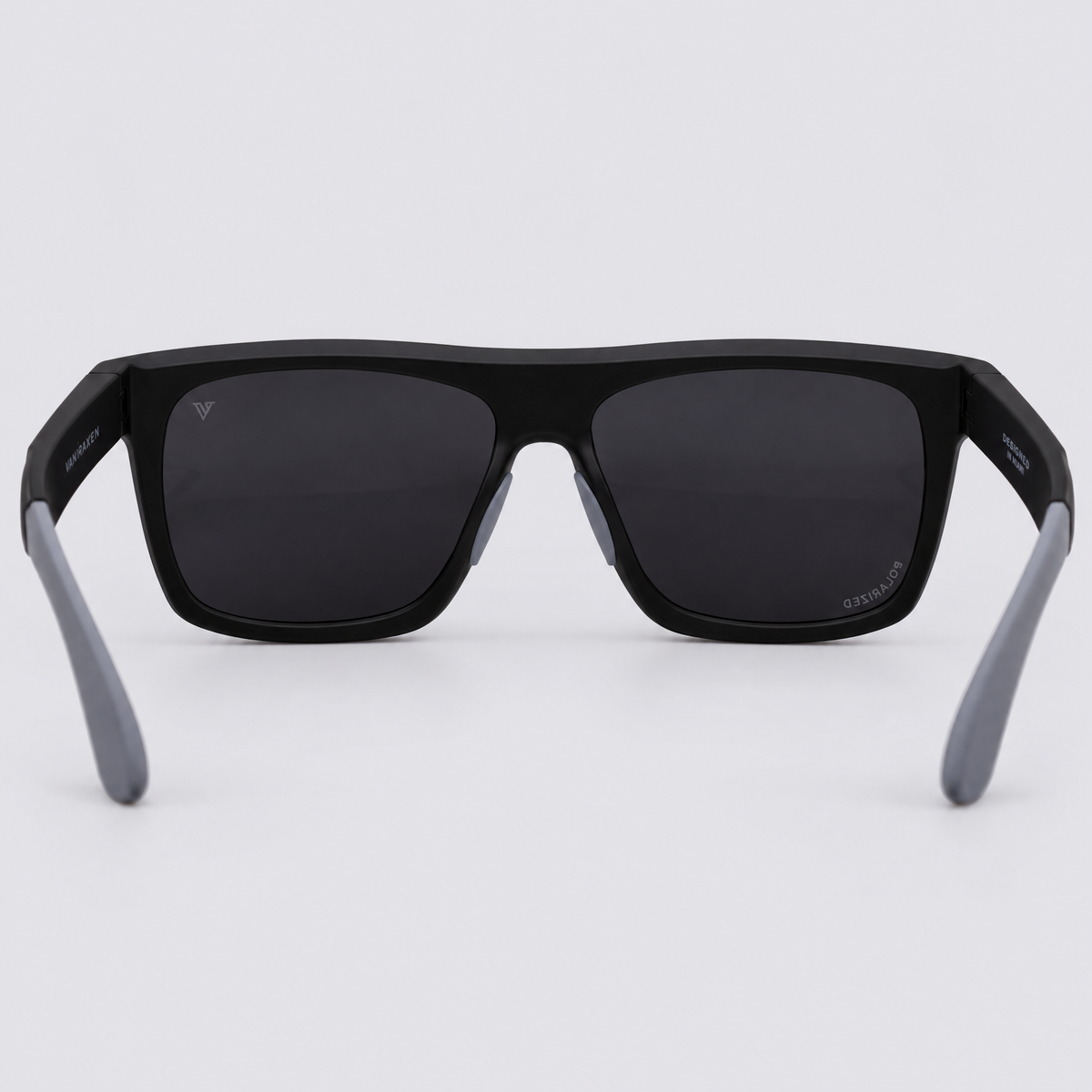Trailvision Wayfinder sunglasses, Matte Black frame with grey temple tips and polarized Smoke lenses, back view